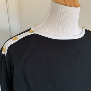 Black with white trim and gold buttons long sleeve top